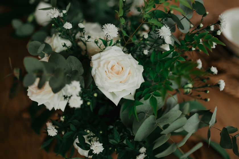 Close-up of white roses in a floral arrangement